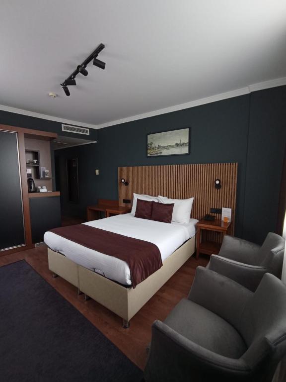 Postel nebo postele na pokoji v ubytování Gosterisli Otel