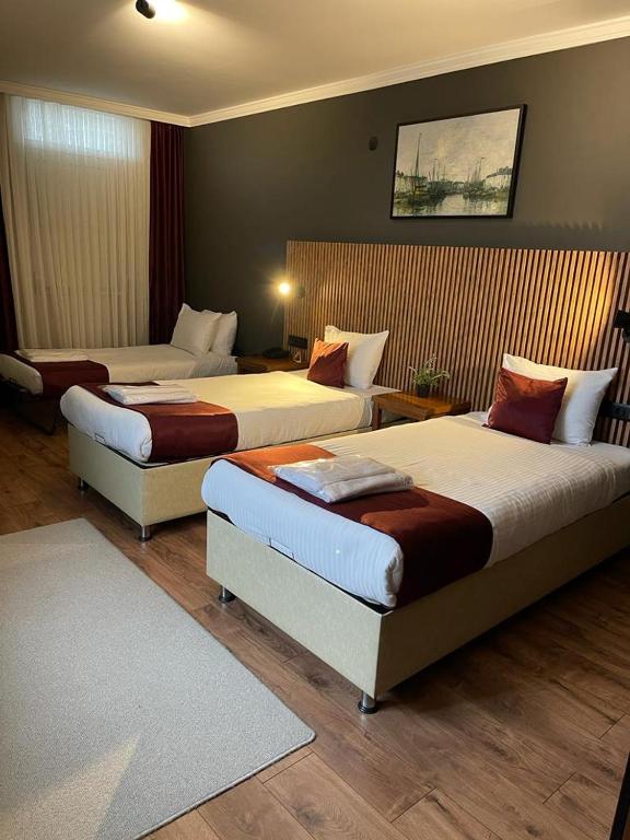 Postel nebo postele na pokoji v ubytování Gosterisli Otel
