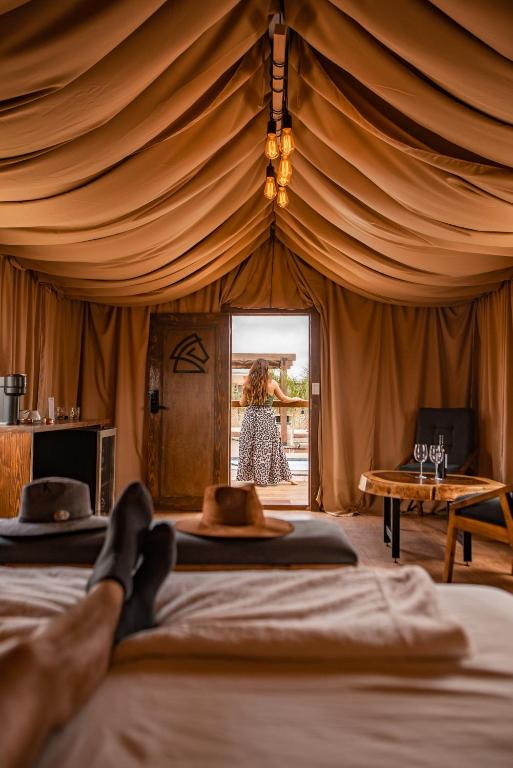 Postel nebo postele na pokoji v ubytování Indomito Resort & Hotel Boutique