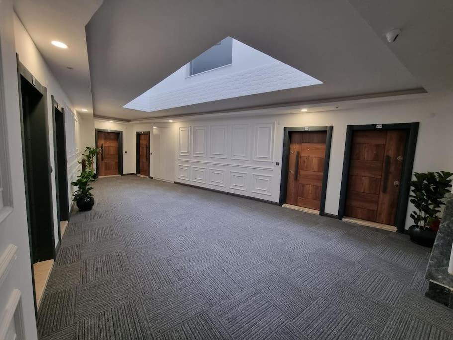 an empty hallway with a skylight in a building at Royal Homes 405 in Antalya