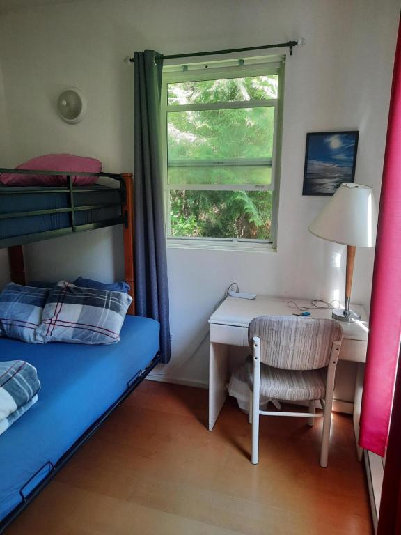 Postel nebo postele na pokoji v ubytování C&N Backpackers - Ucluelet