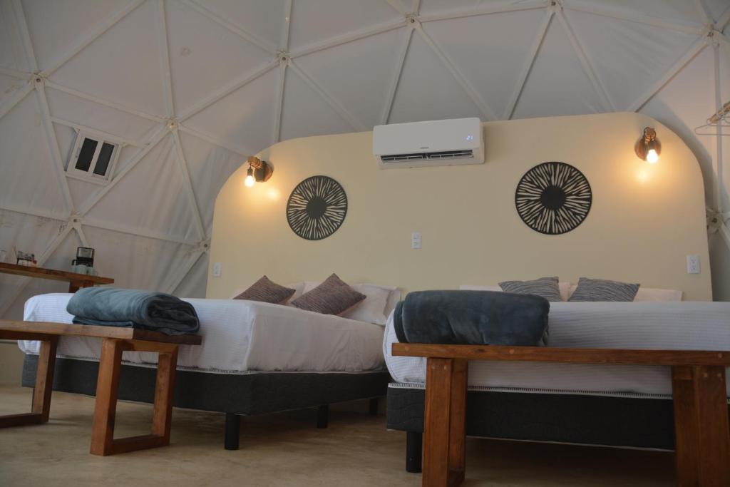 Postel nebo postele na pokoji v ubytování Glamping Mayan Glam
