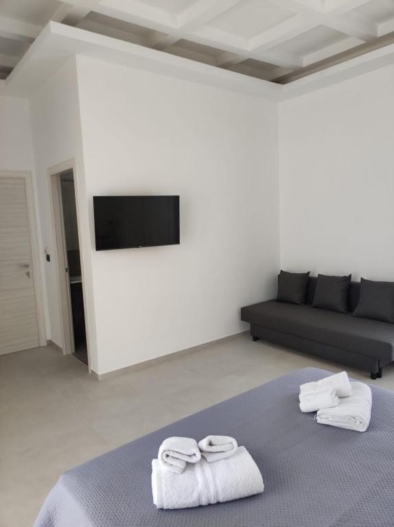 TV a/nebo společenská místnost v ubytování Villa Rita Apartament & Rooms