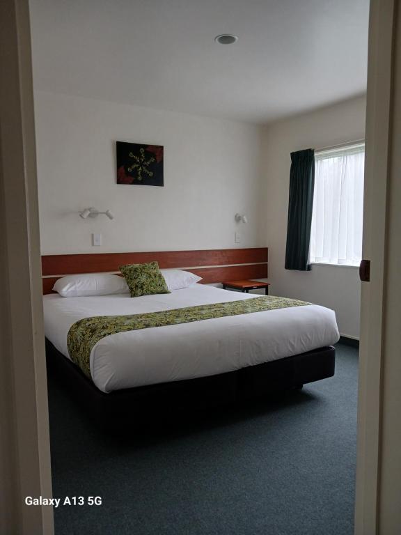 Postel nebo postele na pokoji v ubytování Anatoki Lodge Motel
