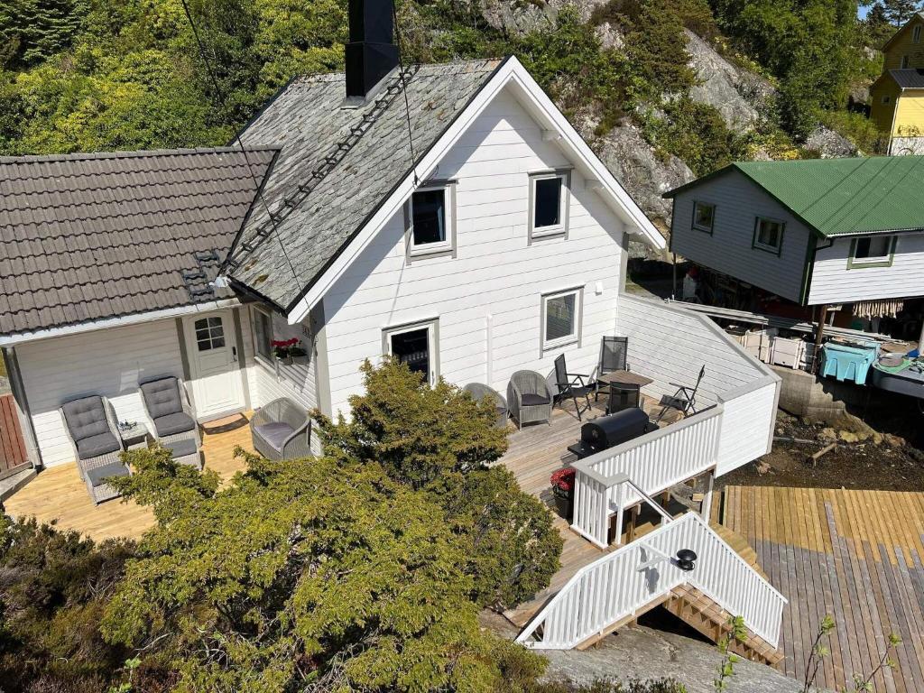 an aerial view of a white house with a deck at Holiday home Brandasund II in Rolvsnes