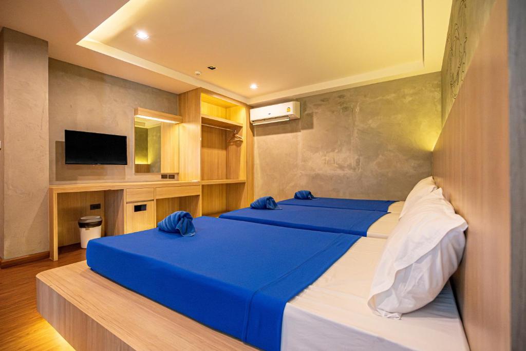 Postel nebo postele na pokoji v ubytování Patong Poshtel