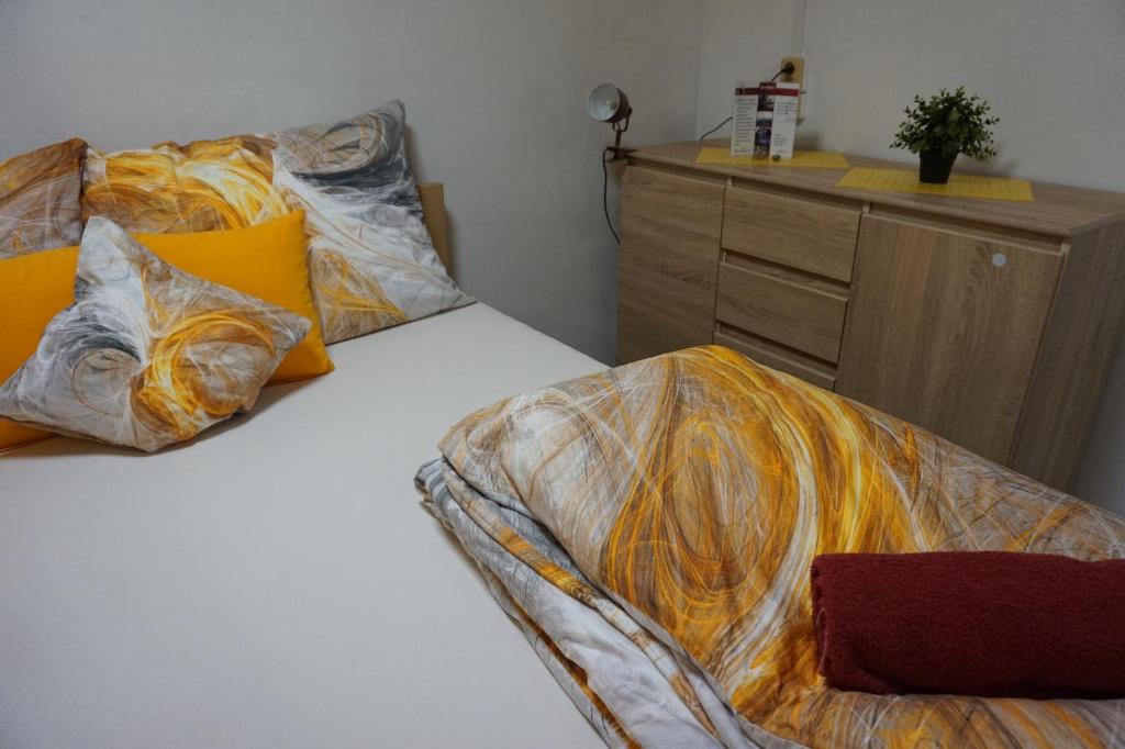 Łóżko lub łóżka w pokoju w obiekcie Penzion a restaurace Na Hvězdě