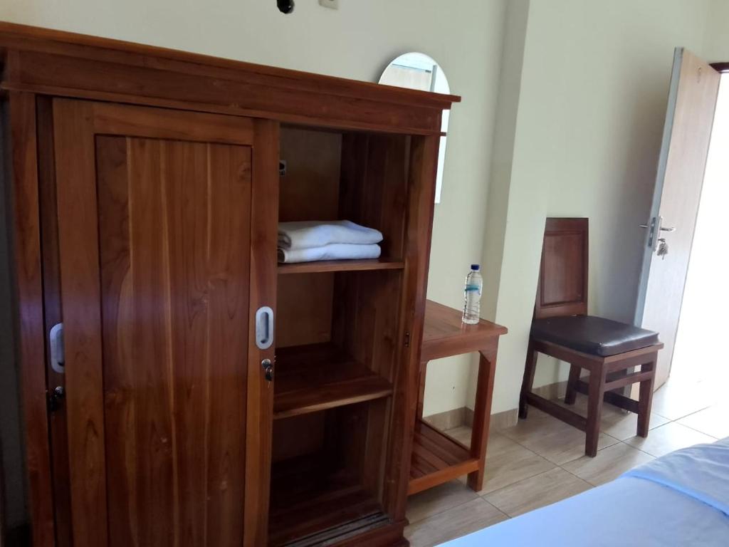 Postel nebo postele na pokoji v ubytování Pesona bali Room and restaurant