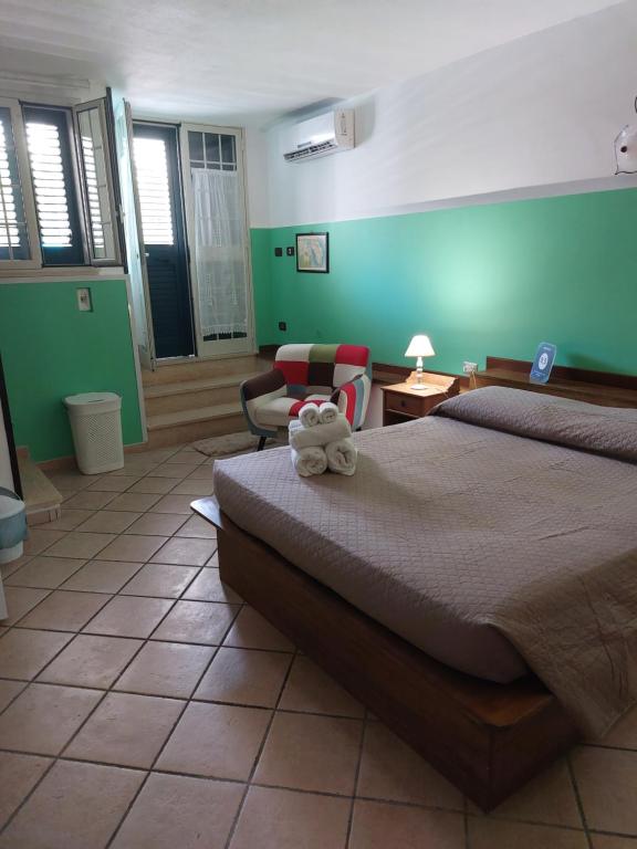 Postel nebo postele na pokoji v ubytování B&B Albachiara