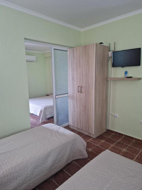 Postel nebo postele na pokoji v ubytování Dara Hotel