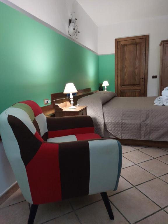 Postel nebo postele na pokoji v ubytování B&B Albachiara