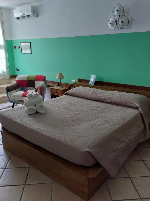 Postel nebo postele na pokoji v ubytování B&B Albachiara