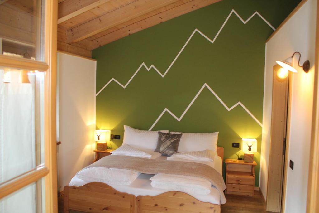 Postel nebo postele na pokoji v ubytování Agriturismo ValFraja
