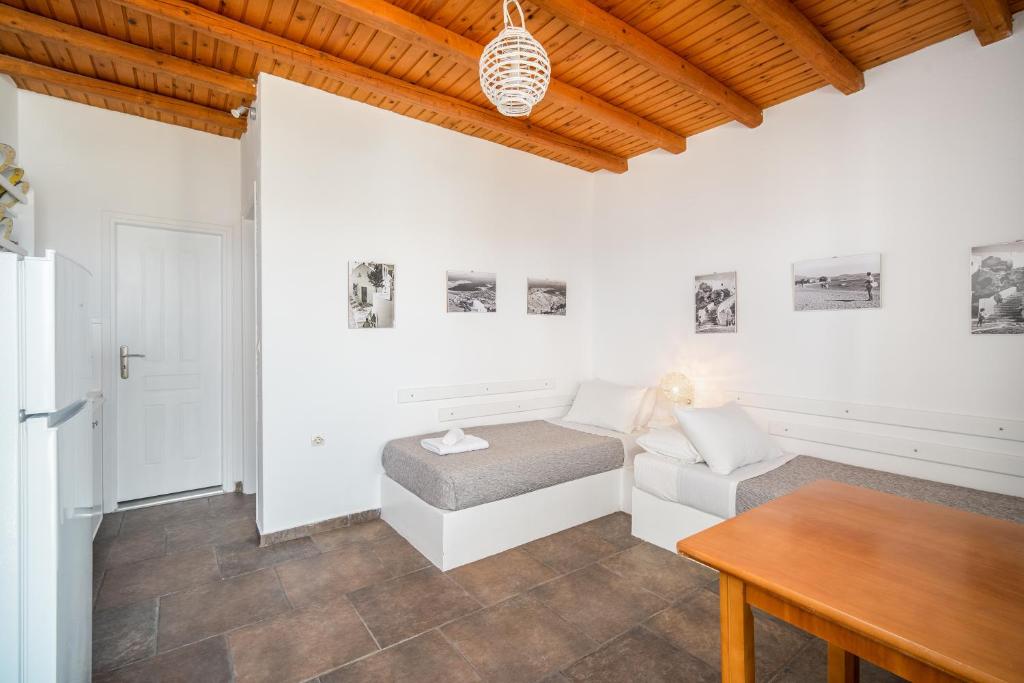 Uma cama ou camas num quarto em Ta Kabia Studios