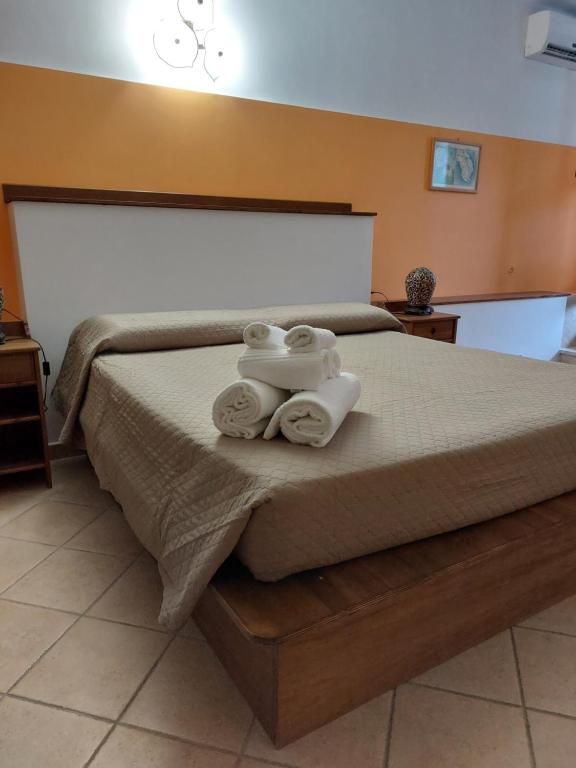 Postel nebo postele na pokoji v ubytování B&B Albachiara