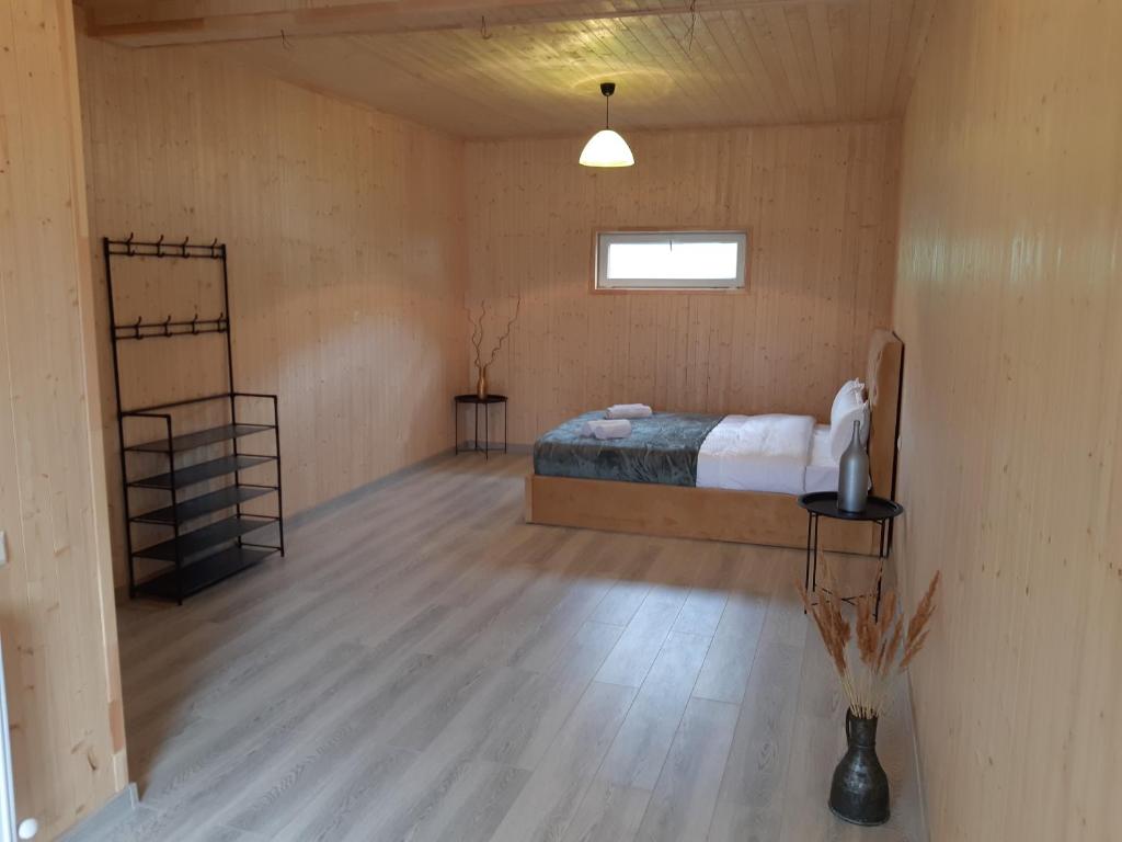 Postel nebo postele na pokoji v ubytování Elegia