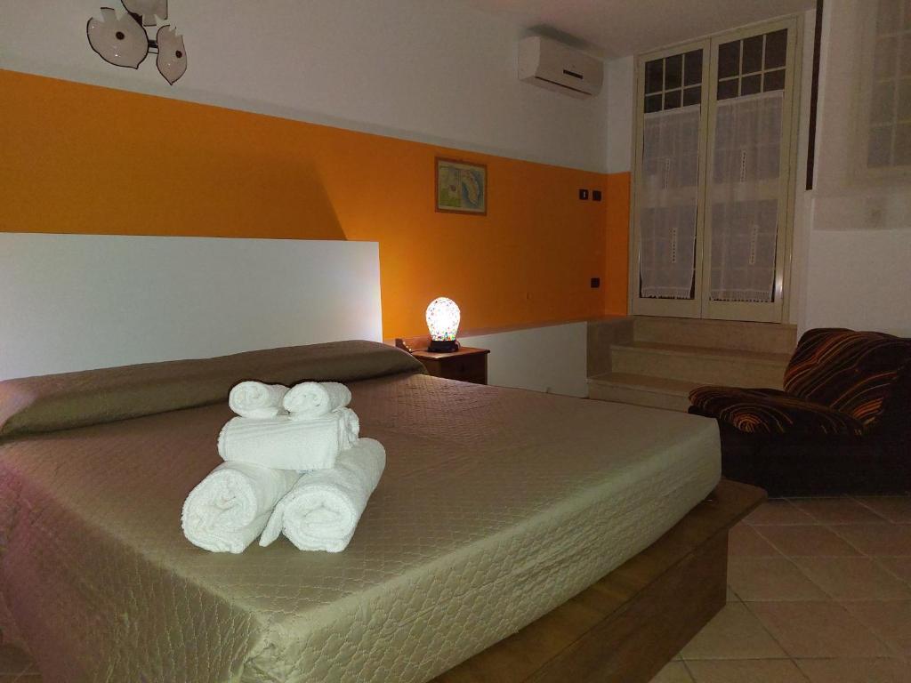 Postel nebo postele na pokoji v ubytování B&B Albachiara