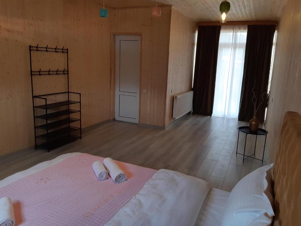 Postel nebo postele na pokoji v ubytování Elegia