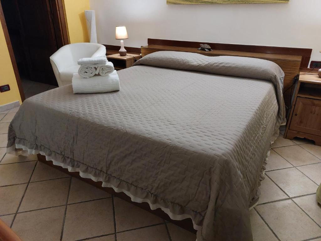 Postel nebo postele na pokoji v ubytování B&B Albachiara