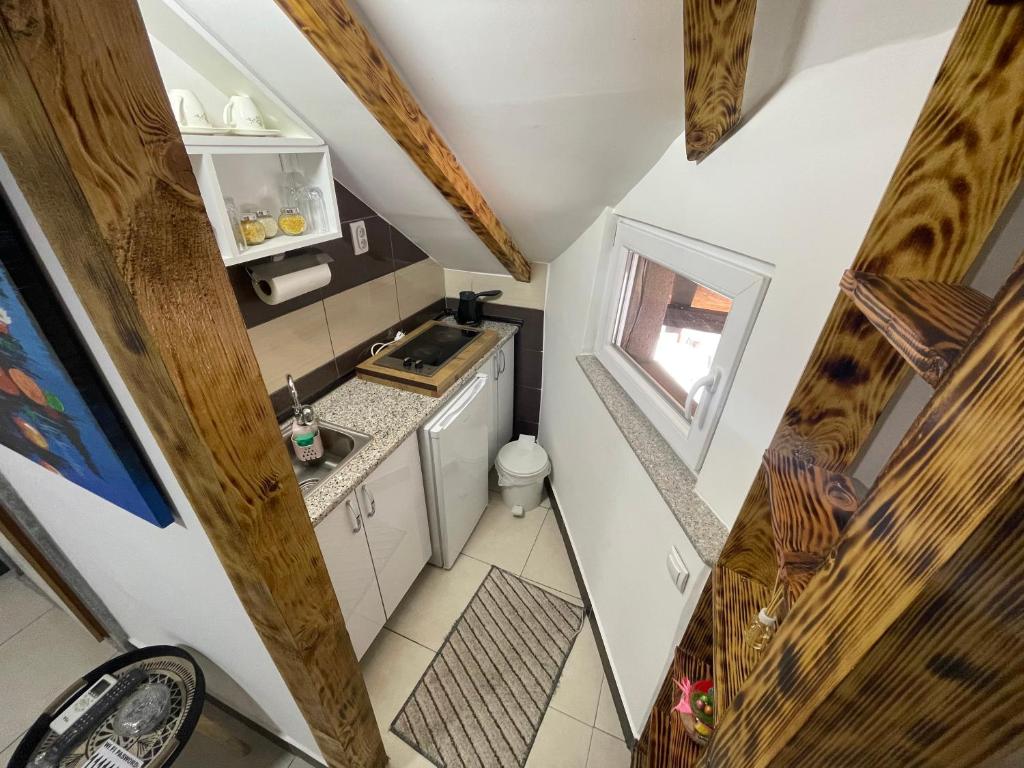 Kuchyň nebo kuchyňský kout v ubytování APARTMAN Pahuljica