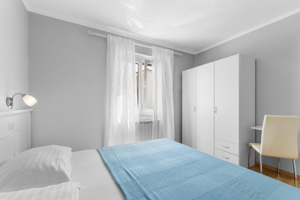 Postel nebo postele na pokoji v ubytování Villa Hope - Apartments with Shared Pool