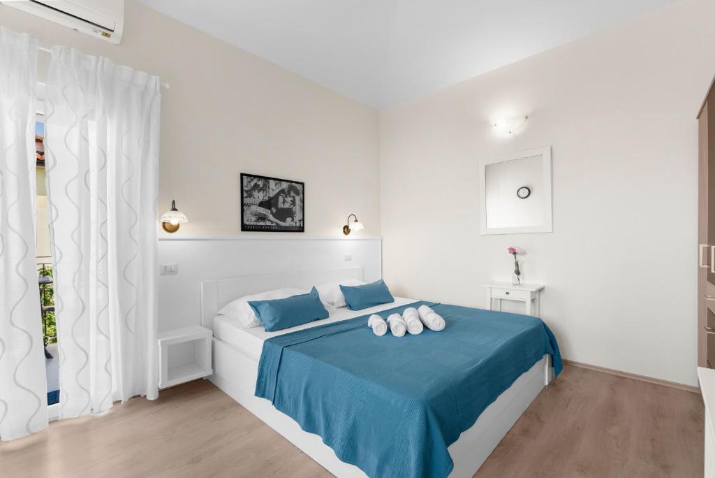 Postel nebo postele na pokoji v ubytování Villa Hope - Apartments with Shared Pool