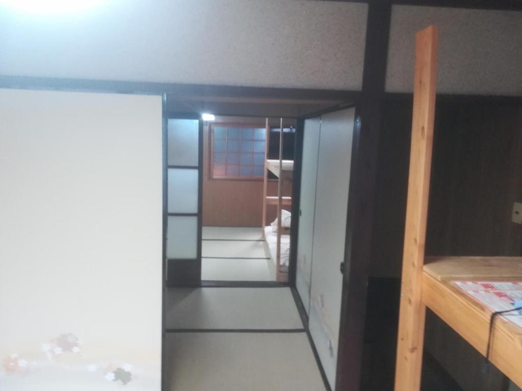 Postel nebo postele na pokoji v ubytování ez guest house