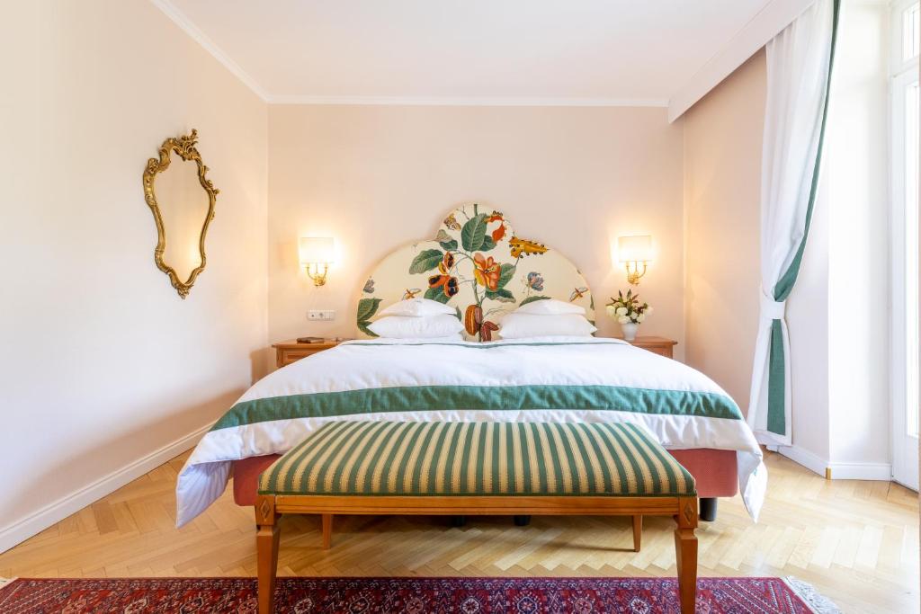 Posteľ alebo postele v izbe v ubytovaní Hotel Elephant