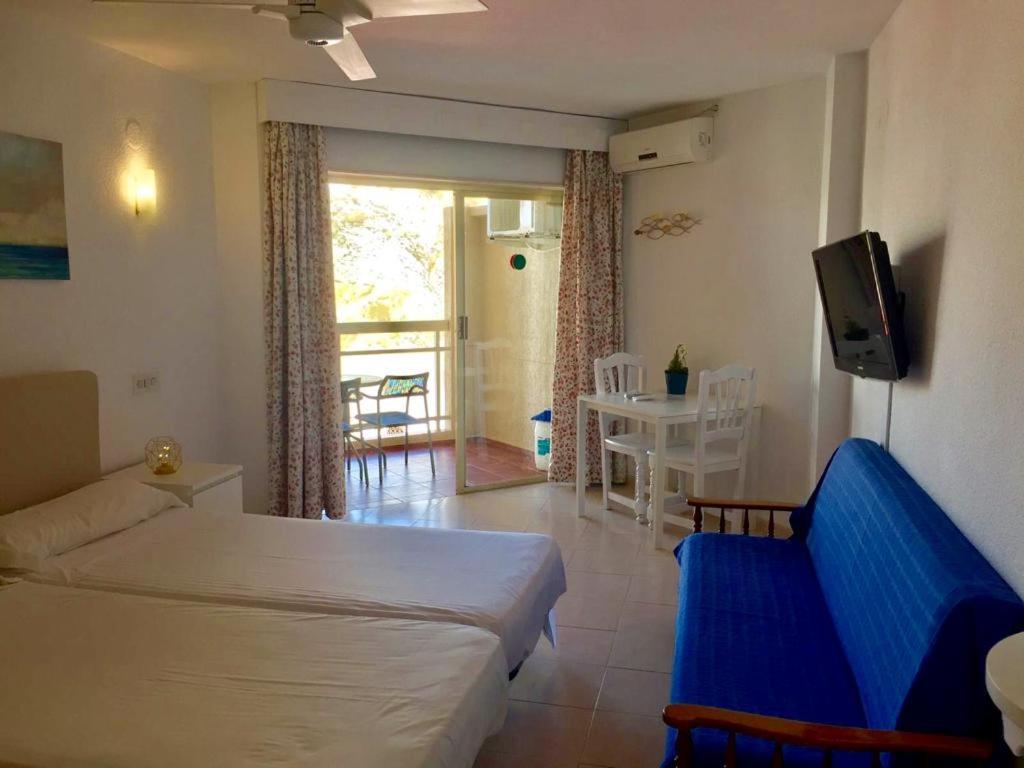 Posteľ alebo postele v izbe v ubytovaní Apartamentos Apal Chinasol