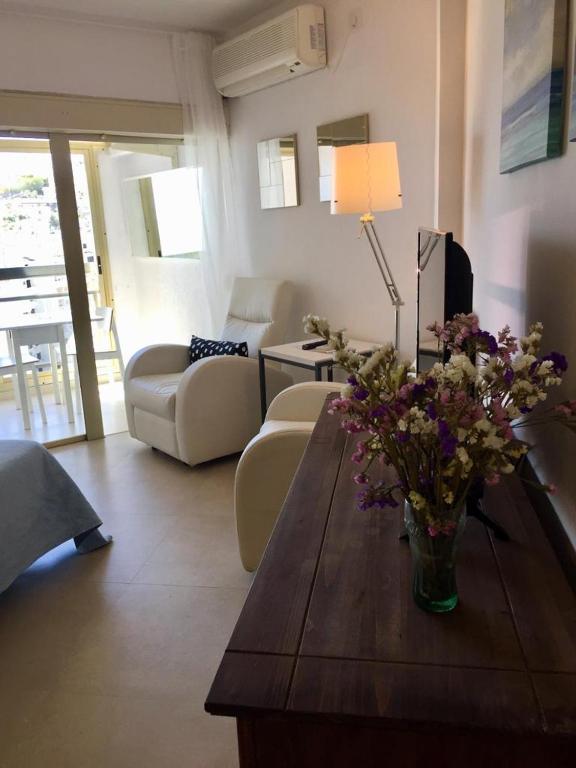 Posedenie v ubytovaní Apartamentos Apal Chinasol
