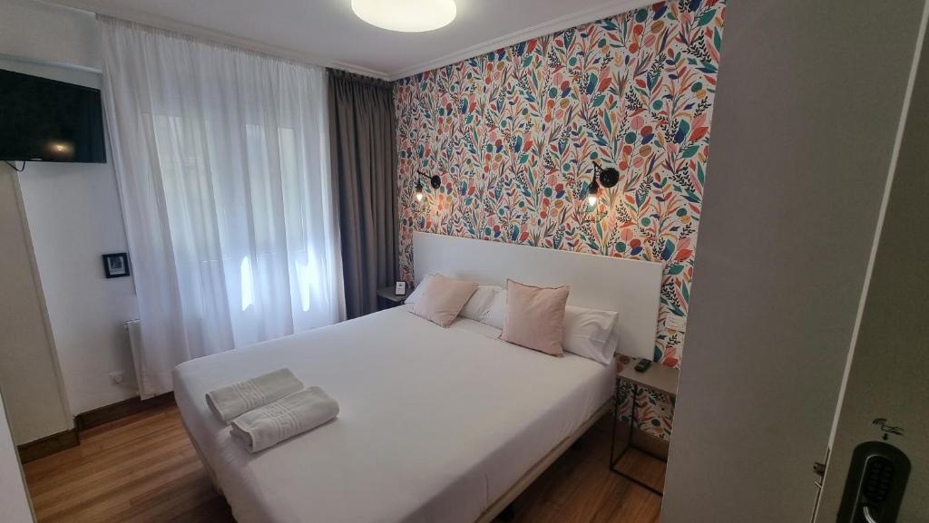 Postel nebo postele na pokoji v ubytování Hotel Norte