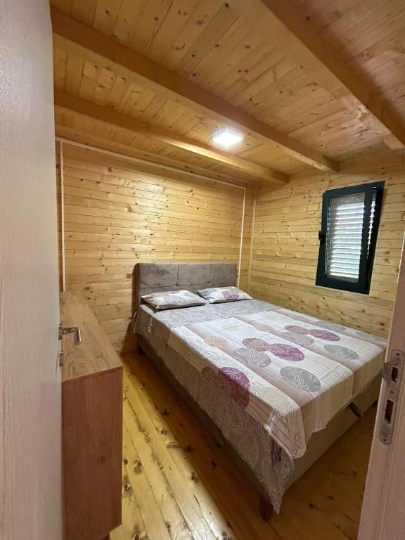Postel nebo postele na pokoji v ubytování Sojenica Tamara