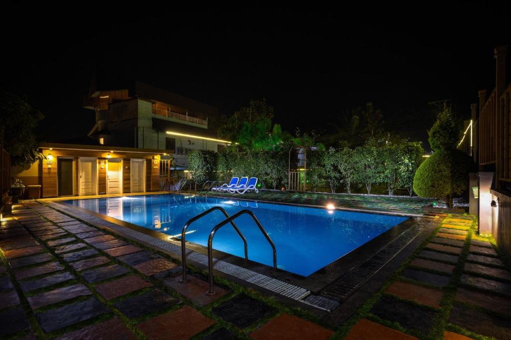 Bazén v ubytování Star Emirates Luxury Resort and Spa, Munnar nebo v jeho okolí