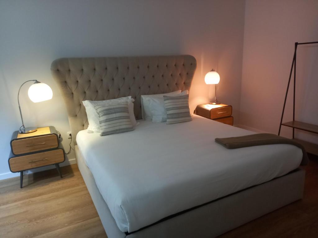 Postel nebo postele na pokoji v ubytování Quinta Casa Do Quintal