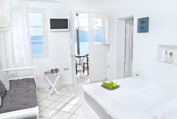 A bed or beds in a room at Archondoula Studios