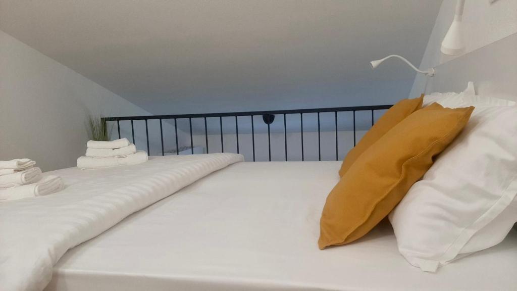 Postel nebo postele na pokoji v ubytování Apartma Lima