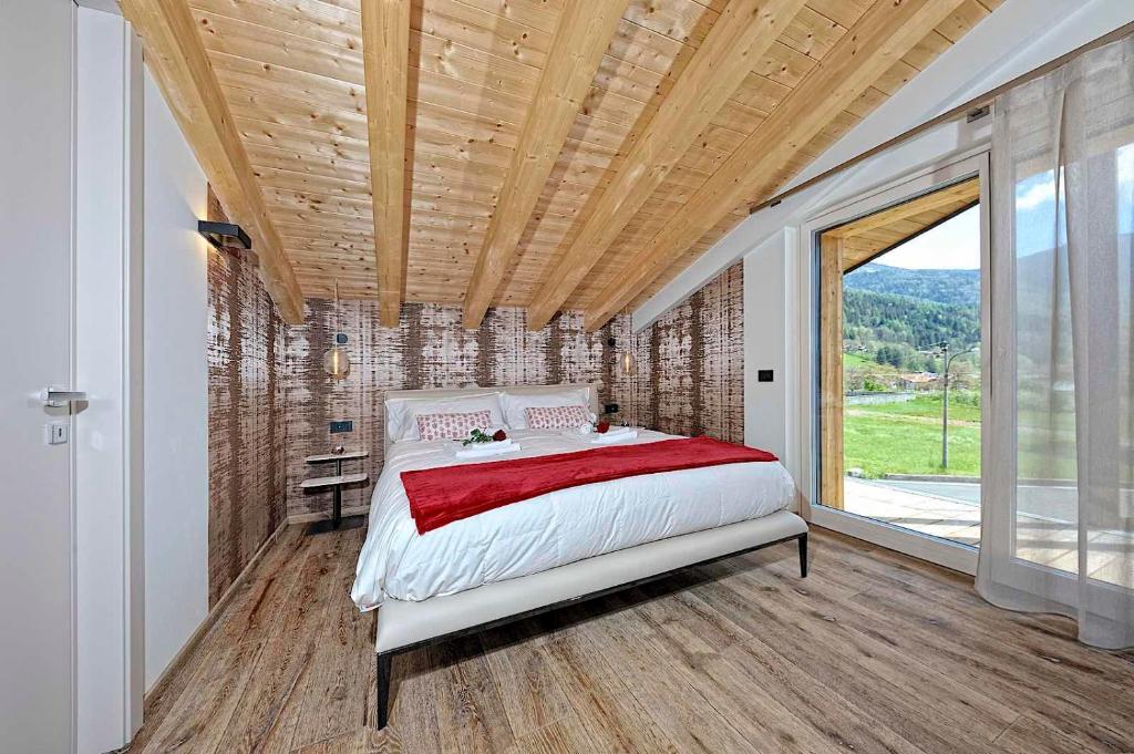 Postel nebo postele na pokoji v ubytování Lux Domotic Apt-Chalet Dolomites