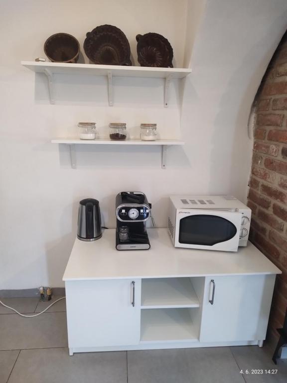 Kuchyň nebo kuchyňský kout v ubytování Chaloupka která má šmrnc