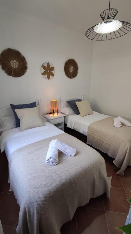 Posteľ alebo postele v izbe v ubytovaní Casa Rural Villa Arylex