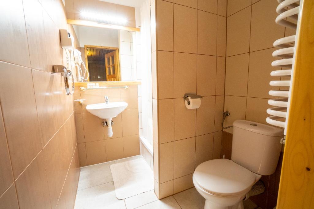 Kúpeľňa v ubytovaní Gościniec Dębowa Gazdówka