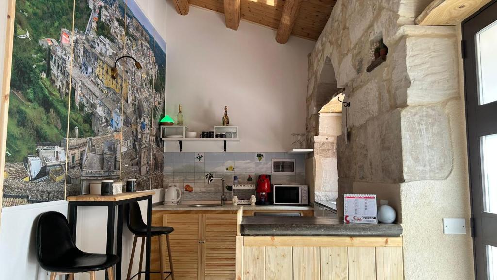 Kuchyň nebo kuchyňský kout v ubytování Vallata San Leonardo