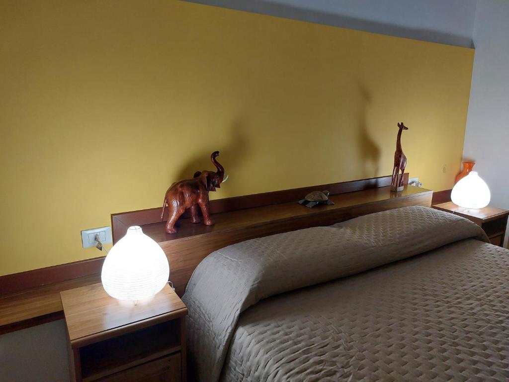 Postel nebo postele na pokoji v ubytování B&B Albachiara