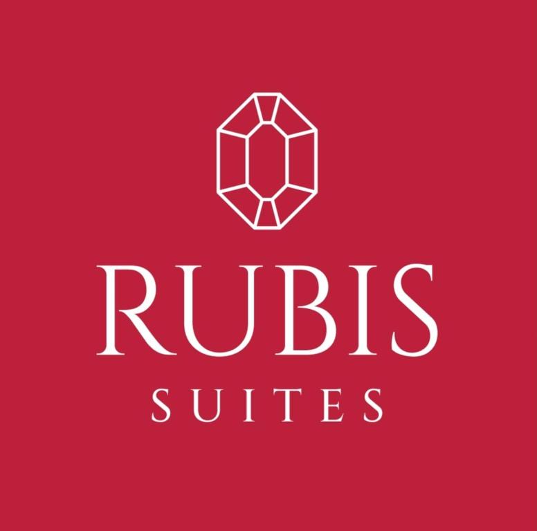 a red logo with the words rings suites at RUBIS SUITE in Mostar
