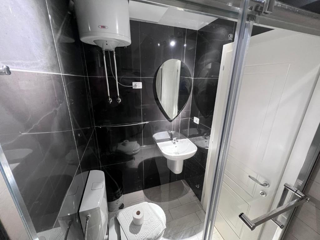 Koupelna v ubytování Bobi Hotel