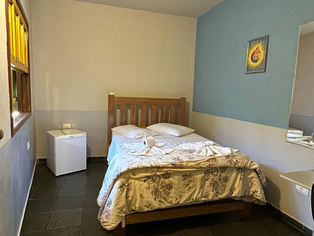 Postel nebo postele na pokoji v ubytování Hotel dos Sonhos