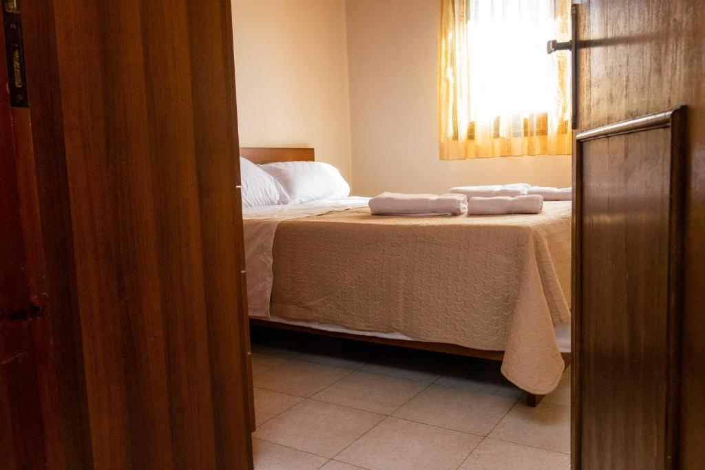 Postel nebo postele na pokoji v ubytování kazaplagia