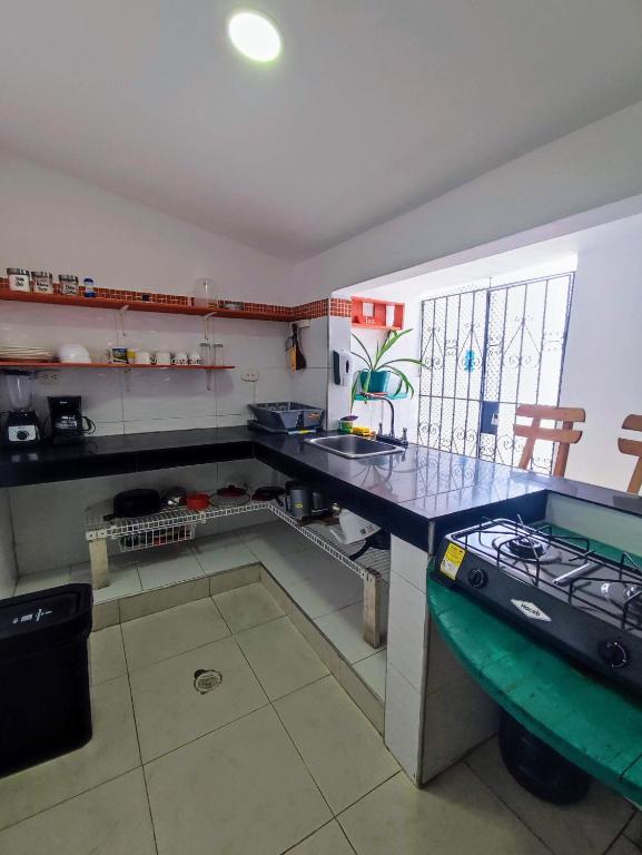 Kuchyň nebo kuchyňský kout v ubytování Bona Vida Apartments