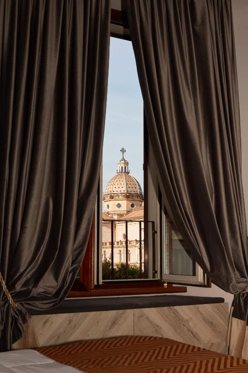 Postel nebo postele na pokoji v ubytování Hotel Roma Vaticano
