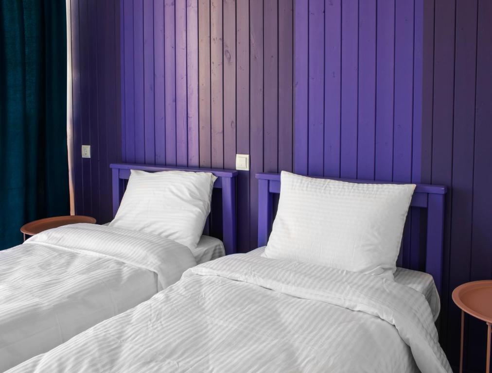 Postel nebo postele na pokoji v ubytování Chateau Tsinandali Hotel