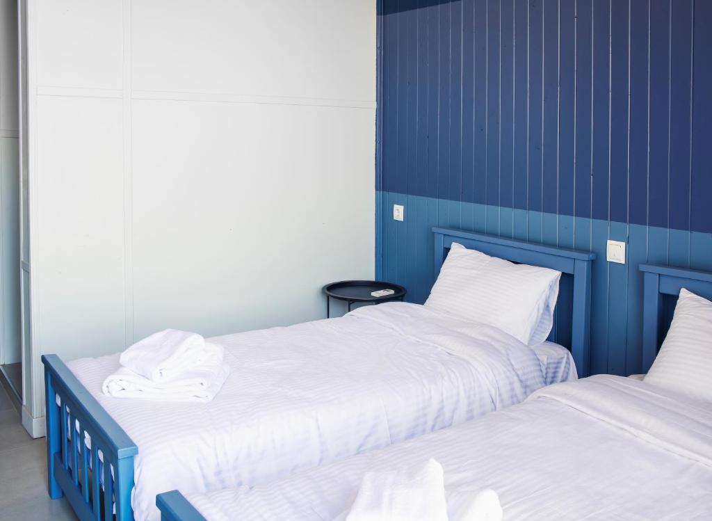 Postel nebo postele na pokoji v ubytování Chateau Tsinandali Hotel